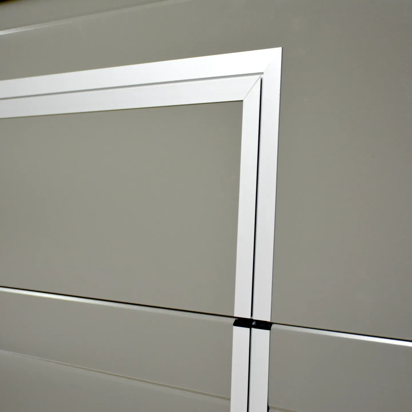 Close-up of the door frame corner and panel join