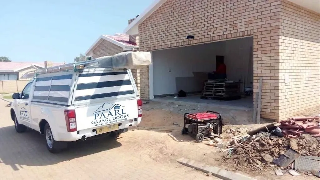 Paarl Garage Doors service vehicle delivering a new garage door to a new-build home